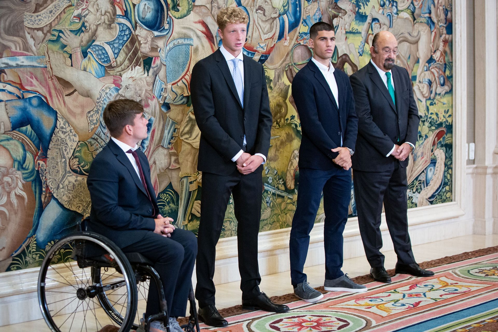 King Felipe VI of Spain (R) receives the Spanish tennis player winners at the US Open 2022: (L-R) Martin De La Puente Riobo, Martin Landaluce Lacambra, and Carlos Alcaraz (Image: Getty)