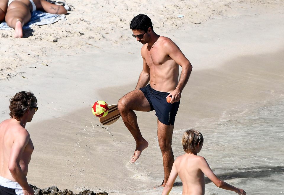 Arsenal boss Mikel Arteta plays football on beach as he relaxes during  summer break with stunning Miss Spain wife | The Sun