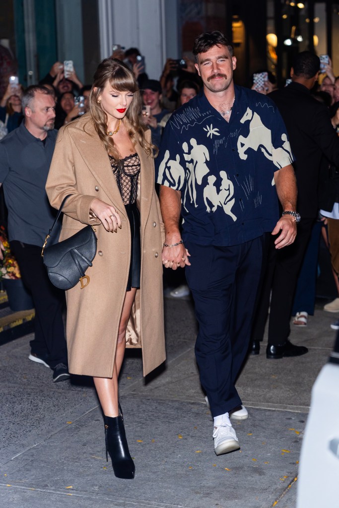 Taylor Swift (L) and Travis Kelce are seen in SoHo on October 11, 2024 in New York City. 